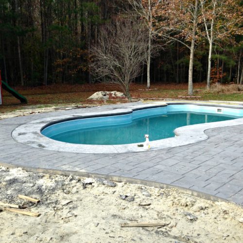 Outer Bank stamped concrete, OBX concrete pool decks, repair pool deck OBX, Camden, Currituck, swimming pool upgrades OBX