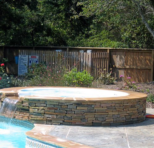 Outer Banks stone swimming pool, stone work OBX, waterfalls Outer Banks, spillover spas, OBX spa*